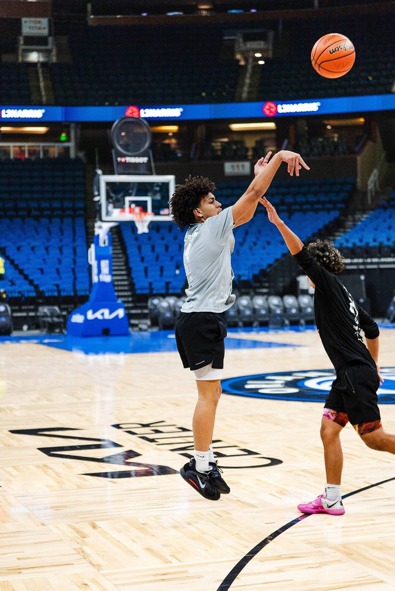 Player in a Zeus Skills shirt moving through a warm-up