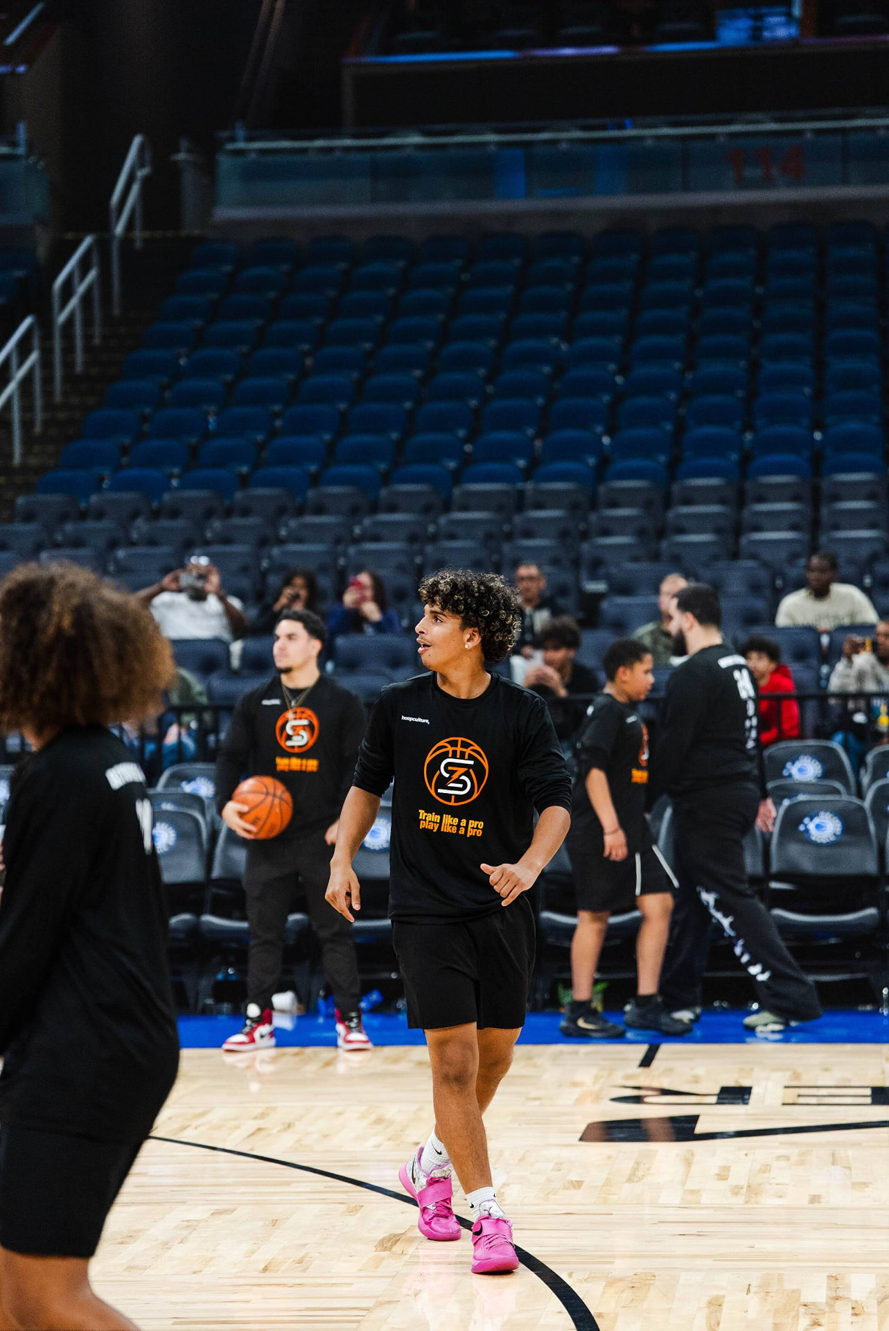 Player shooting over a defender during live reps