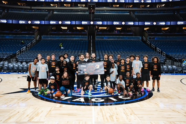 Zeus Skills athletes and coaches on an NBA court after a training experience